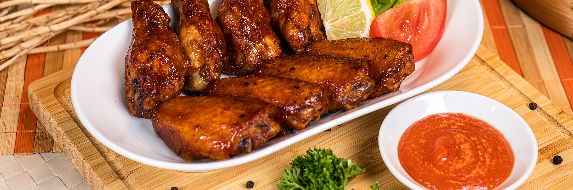 BBQ Chicken Wings Recipe | Roatan Provision BBQ chicken wings with barbecue sauce for game day from Roatan Provision