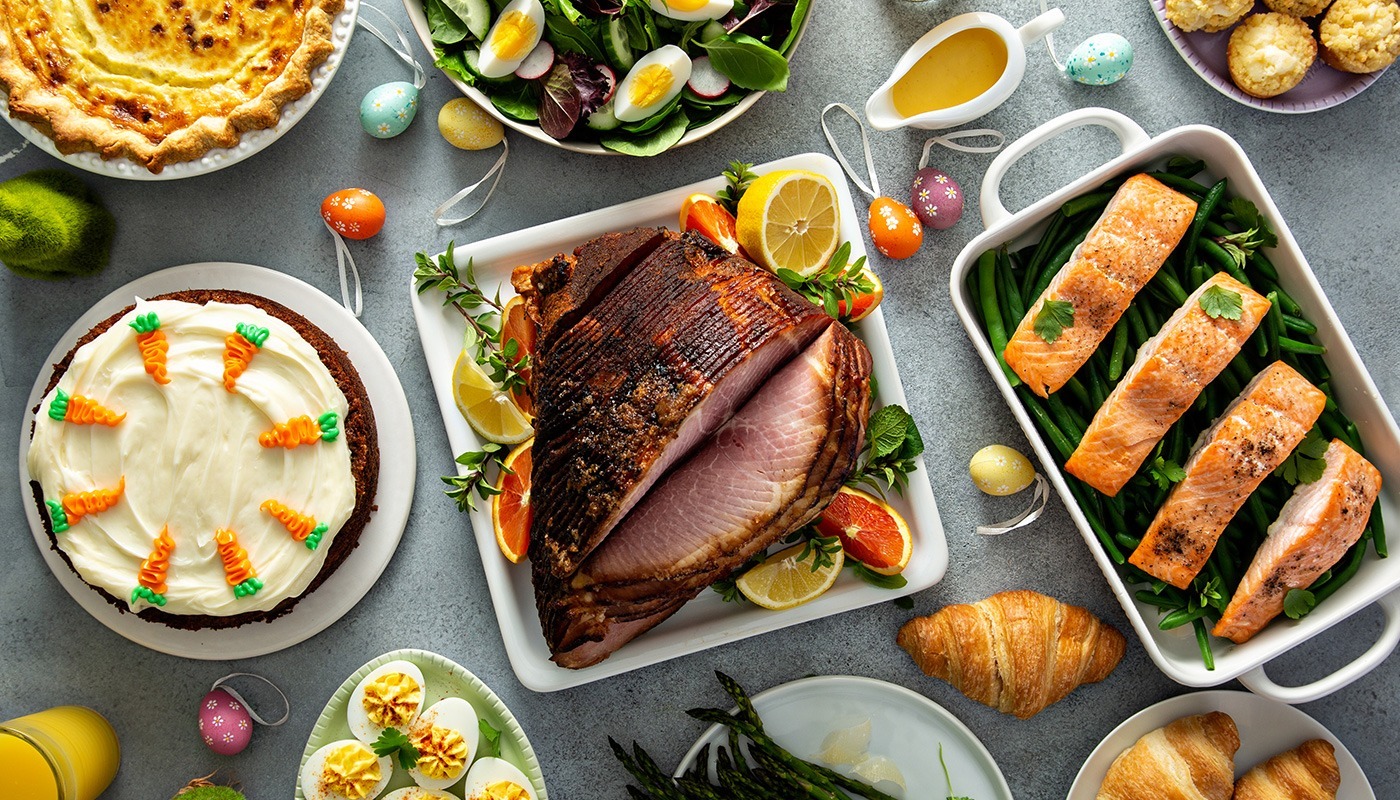 Seasonal food selection featuring roasted meats, fresh vegetables and festive dishes at Roatan Provision.